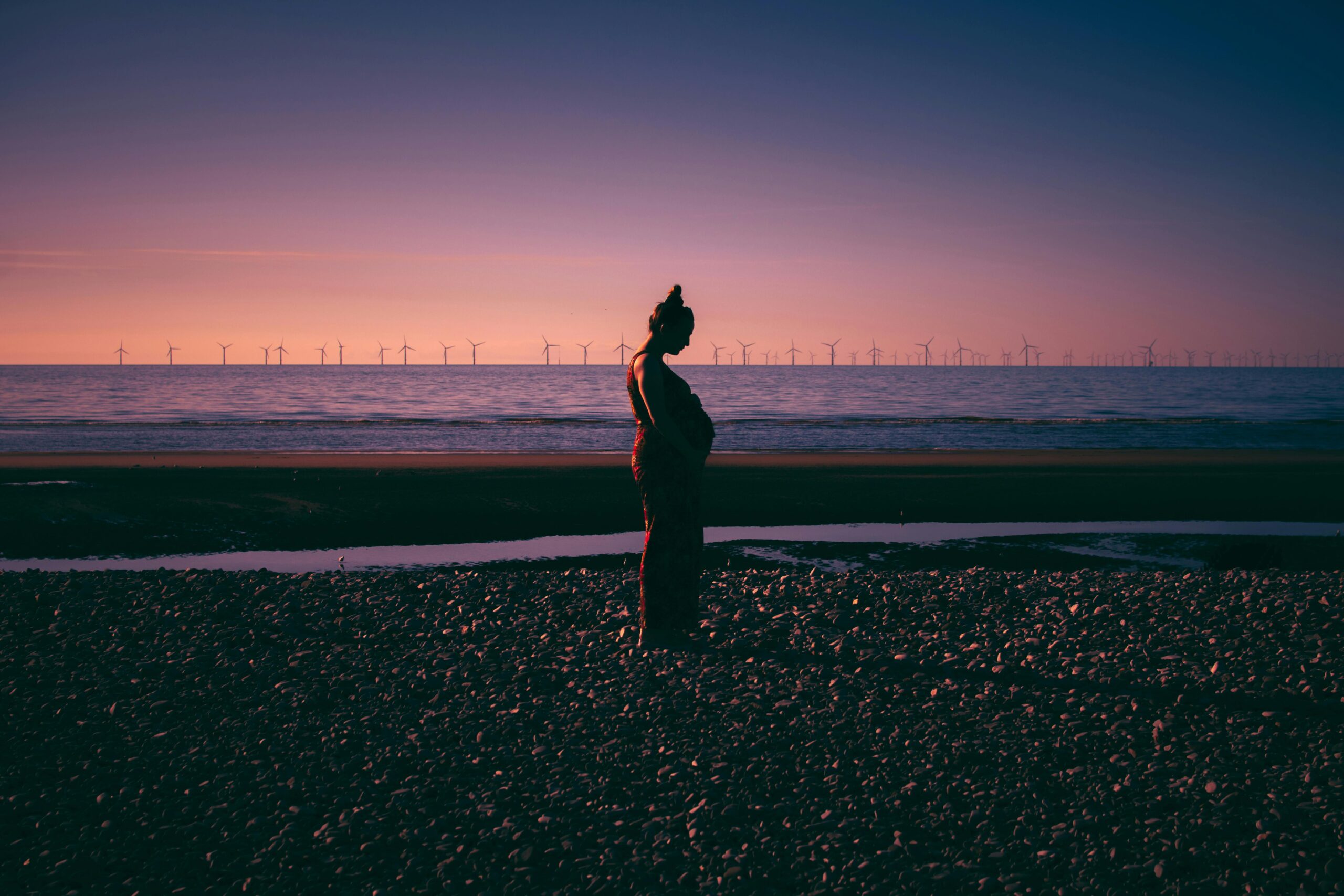 PCOS Pregnant woman on beach