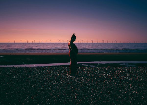 PCOS Pregnant woman on beach